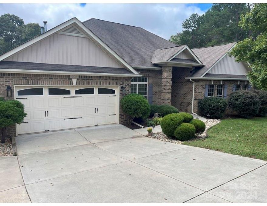 Welcome to this stunning ranch in Georgia Mills Plantation! Boasting 4BR 3.5 upgraded baths. Home sits on .79 acres and houses a heated in ground saltwater pool/spa, outdoor kitchen, large workshop, and Palram 8 x 16 greenhouse. Kitchen has S.S. appliances, large butcher block island, granite tops, and has a separate eating area along with formal dining room. The oversized master has tray ceiling, custom walk in closet, and an en suite including large soaker tub, and 5' walk in shower. All bedrooms have ceiling fans. There is beauty, tranquillity, and privacy in this perennially landscaped yard which sits next to a forever wild lot. Ready for relaxation or entertainment, enjoy the pool/spa, patio, and outdoor kitchen. Vaulted cedar kitchen features Blaze natural gas grill, fridge, sink, and storage with Taj Mahal Quartzite tops. All this backs up to a 24x40 HVAC controlled garage with 1/2 bath and 440 sq' of storage.Shop is set up for on demand HWH. House and patio are wired for sound.