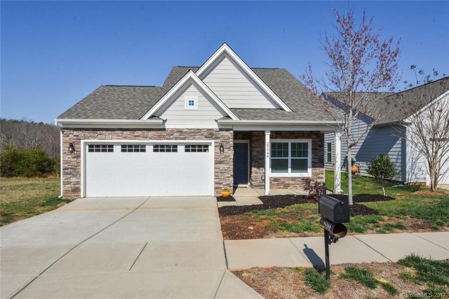 Amenities galore neighborhood,golf, marina, lake, pool and more! Located just 45 minutes from Ballantyne in Charlotte and down the street from downtown Lancaster. Over 1700 sq.ft. of living space, 2-car extended garage for storage, tankless water heater,hardwoods on main level with wainscoting, S/S appliances, granite and tile throughout home. 2 master bedroom up/rec room, with full bath, plus plenty of storage. walking distance to pool, tennis courts and lake picnic area. Come see,will not last