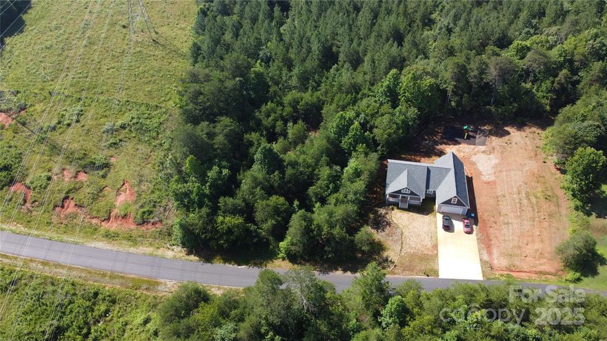 HUGE 1.36 ACRE IN RIVER RUN!  TUCKED TOWARDS THE BACK OF THE NEIGHBORHOOD THIS HUGE LOT IS PERFECT FOR BUILDING YOUR FOREVER HOME!   NO HOA!!  JUST LIGHT CCR's!   BRING YOUR BUILDER, HOLD THE LOT AS INVESTMENT, THIS LOT IS READY TO GO!   Water / Septic (IP ATTACHED)!  WELCOME HOME!