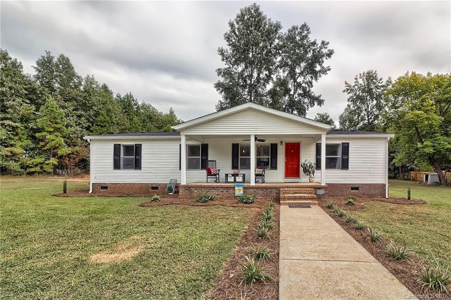 Country living loaded with character! This 3 bedroom, 2 bath home will wow you. Open floor plan. Tons of upgrades: granite counter-tops, kitchen island and back-splash, laminate tile, crown molding, wall-to-wall carpet in bedrooms, master bedroom includes huge bath and jetted tube. Covered porch with ceiling fan and huge deck for country relaxation.
