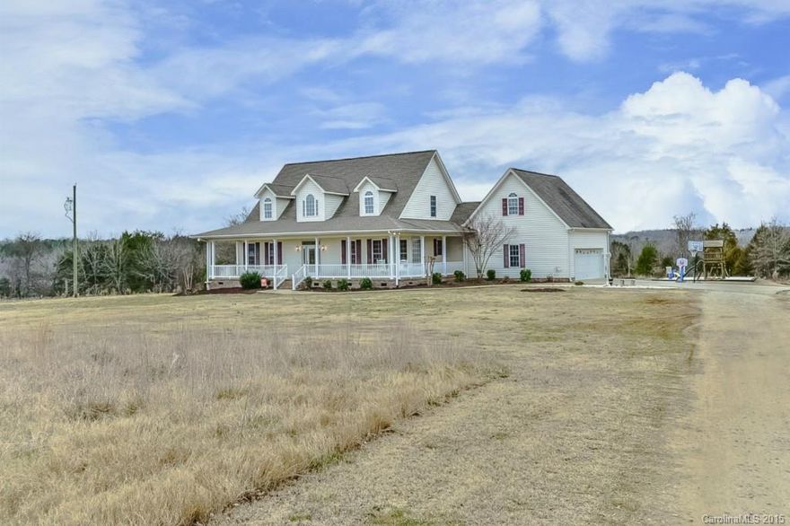 Porches and privacy galore on beautiful  5 acre country setting with 2 acres fenced for pasture!  Park your RV!  Master Suite on main level, open flowing plan, private Bonus Room.  Extensive hardwoods; laundry & baths tiled.  Spacious Kitchen with corian counters.  Great Room with surround sound.  Fabulous storage options both closets & attic.  Screened porch, covered decks off Master & Breakfast Bay, Front Porch! Upper Level Office sometimes utilized as 4th bedroom.