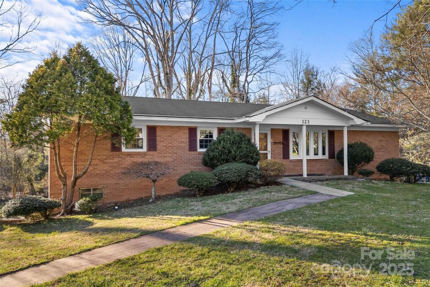 Spacious Brick Ranch in Desirable Sedgewood Community! This home offers the perfect blend of space, convenience, and potential. The main level features a welcoming great room with a dining area and vinyl plank flooring. The kitchen includes original cabinetry & countertops, new stainless-steel dishwasher & refrigerator, and an eat-in area with access to the screened-in porch, ideal for enjoying the natural beauty. The primary suite with ensuite, two additional bedrooms, and a full bath complete the main floor. The fully finished basement adds even more living space with a family room & cozy fireplace, office/flex space, and a utility/laundry room with space for a workshop. Additional features include a large 2-car garage, storage shed, new tankless hot water heater, and a backup gas generator. Situated on a generous lot, with room for outdoor activities, gardening, and more. Easily accessible to hospitals, Asheville Airport, HWY 25, I-26, Downtown Hendersonville, and more!