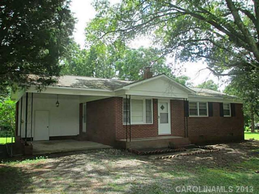 Well kept brick ranch on .92 acre with lots of trees for shade. Kitchen/dining room has a large pantry where laundry could be moved from carport. Updates include roof 2010, gas pack 2011, interior and exterior painting 2013, new rails on carport and new shutters 2013, carpet replaced in living room and all bedrooms 2007.