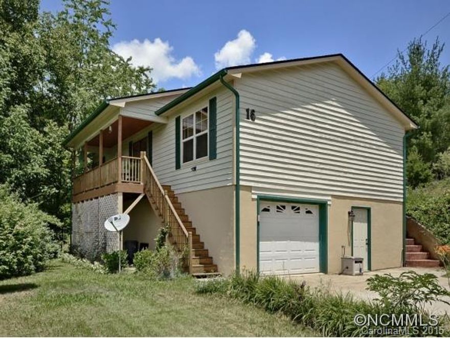 Great mountain getaway or opportunity for first time buyers with this hidden gem in a private, rural setting! Enjoy beautiful long range views from rocking chair front porch.  Open, split bedroom plan with hardwoods.  Neat as a pin with newer roof, hot water heater, HVAC system and stainless appliances.  Level fenced back yard for pets.  Lots of gardening space.  Full unfinished basement for storage or future expansion. USDA Eligible.