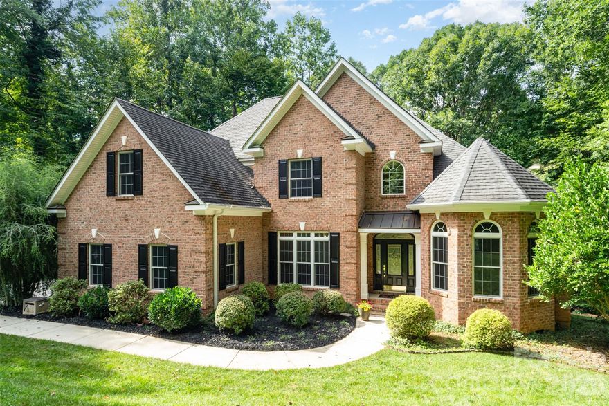 Enjoy the peace and natural beauty of this sought-after neighborhood, nestled alongside Lake Norman State Park. This home offers over 3,200 sq. ft. of spacious living designed for comfort and connection. The gourmet kitchen flows into a cozy keeping room with stone fireplace, while the main-level primary suite provides a private retreat. Upstairs, you’ll find two additional bedrooms, a large bonus room, and generous storage space. Take in serene winter views of Lake Norman from your backyard, where you can launch a paddleboard or kayak directly from the protected cove. Though dock permits aren’t allowed here, the water access makes every day feel like a lakeside getaway. Located just minutes from scenic biking and hiking trails, as well as charming downtown Troutman, this community is perfect for long walks and an active lifestyle.