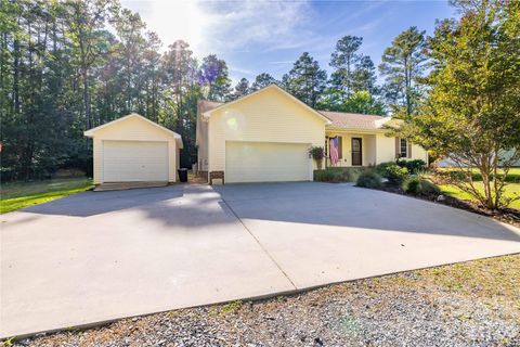 Photo of 204 Millwheel Lane, Mount Gilead, NC 27306 (MLS # 4379035)