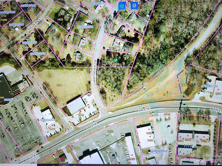 Prime location for you to build your own home.   Approximately .62-acre lot located in the city limits of Rock Hill across from Major shopping center and business complex, just minutes from downtown Rock Hill and I-77.  Great, established neighborhood (Spencer Estates) with no HOA fees. Walking distance to Belleview Elementary School and local dining and shops!! Buyer will need water and sewer taps with City, at their expense. Zoned SF-3.  Make an offer today!  Sold as is.