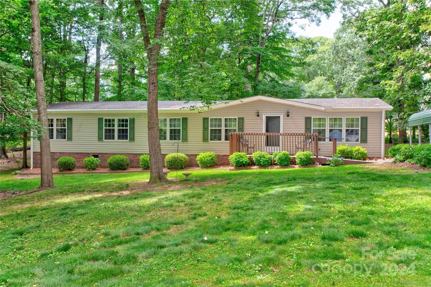 What a find!  This 3 bedroom, 2 bath home is in pristine condition!  The home has a spacious, open floor plan with a large kitchen, a great room with a fireplace and a large dining area.  The cozy breakfast nook overlooks the shaded back yard.  The split bedroom plan features a large primary bedroom and bathroom with double vanities, a soaking tub, step-in shower and a huge closet.  You are sure to enjoy this beautiful setting, on over a half acre lot with a quiet 'country-life' feel.  Surrounded by nature, but still just minutes to I-85 for an easy commute to Salisbury, Kannapolis, Concord and Charlotte.  Won't last long at just $225,000!  Make your appointment today!