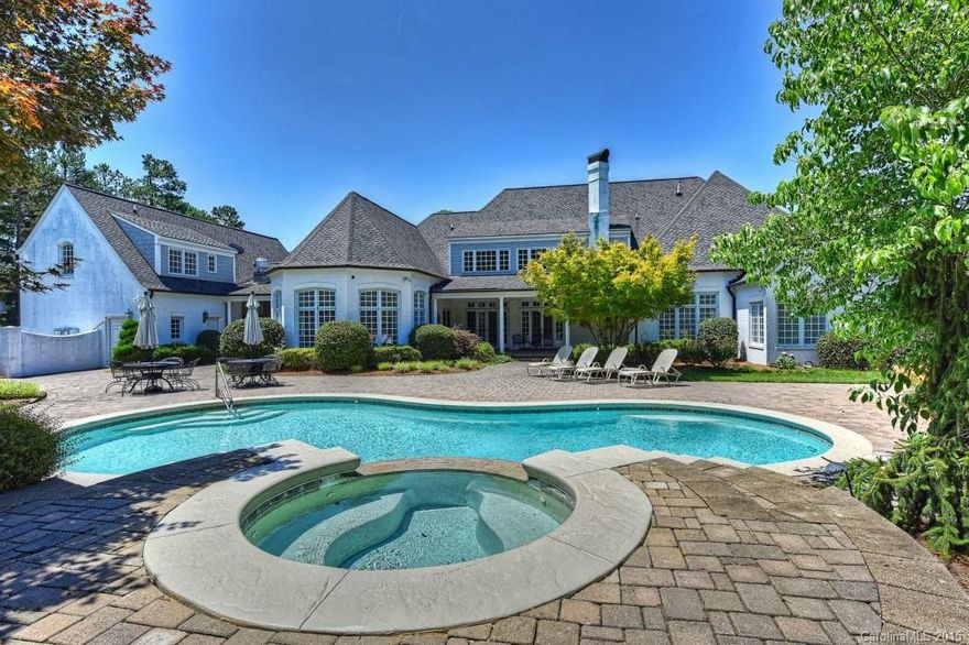 An architectural masterpiece on 2 pristine acres, with 6775 SF of glamorous, impeccably-detailed living space. Voluminous rooms are graced by dramatic high ceilings, wood floors, custom trim/millwork, opulent lighting, fireplaces & huge windows. A spectacular 2-story great room, formal DR & top-of-the-line chef’s kitchen aggrandize entertaining. A sumptuous master suite, master bath retreat + numerous bonus rooms, sparkling pool, spa, covered patio & deck w/built-in BBQ optimize luxuriousness.