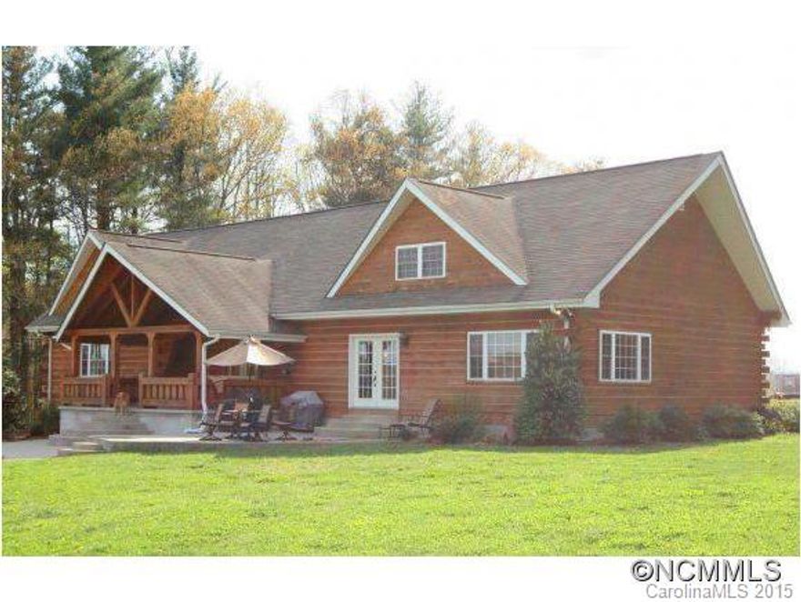 Custom Log Home Priced for Quick Sale on 1.6 level Acres at the Incredible price of Only $67 per square foot! Conveniently located in tranquil setting. Features: 4120 Sq Ft/2600 on Main, 3BR/2.5BA, Cathedral Ceilings, Huge Gourmet Kitchen, Granite Counters & SS Appliances, Luxurious Master Suite, Soaring Stone Fireplace in Great Room, Dining/Living Room, Covered Porch & Patio. Needs a little tlc but is priced accordingly and being sold "AS-IS".
