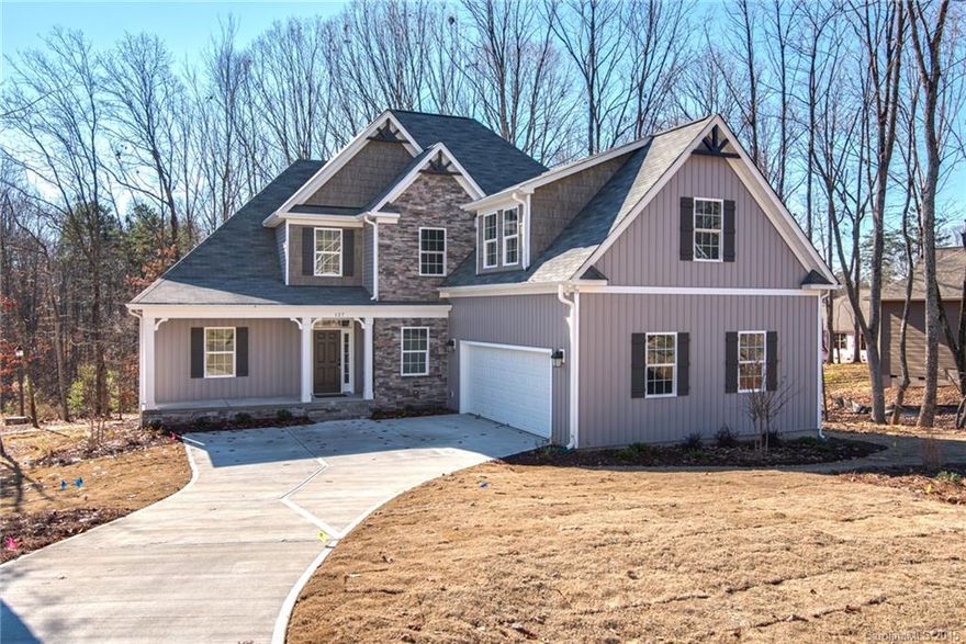 **New Construction*** 4 Bedroom/3.5 Bath with bonus room.  Soaring 2 story ceilings in the living room and foyer.  Office and master suite on the main level.  Varying width wood floors. Beautiful kitchen has stainless steel appliances and granite countertops.   Over 1/2 acre lot with mature tree.  Only 6 lots remain in subdivision.