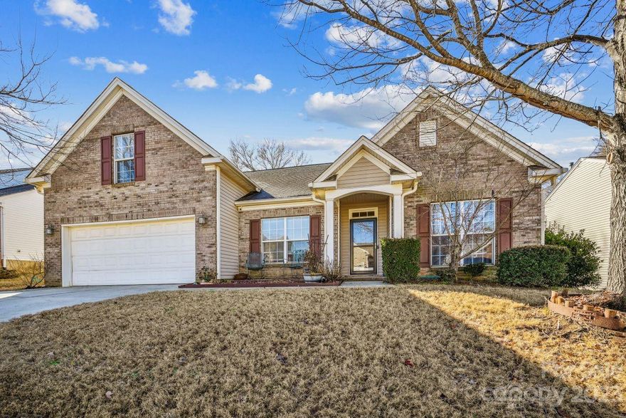 Don't miss this gorgeous ranch w/bonus room in the popular & rapidly growing Indian Land area! The original owners have added tons of upgrades including a lovely 3 season room with vinyl windows, wood & tile flooring, built-in shelving in the office, & fencing in the back yard. The kitchen has been upgraded w/granite counter tops, recent top of the line Whirlpool stainless appliances, subway tile backsplash, & oversized sink. The HVAC was replaced with an upgraded 16 seer unit approximately 6 yrs. ago. Upgraded gutters & downspouts have been added. The split BR plan is sure to please with 3 BRs downstairs and a bonus room/BR on the upper level.  The primary  BR has an adjoining office/nursery/flex space to fit the new owner's specific needs. 9 foot ceilings, beautiful moldings, tray ceilings, & ceiling fans all add to the beauty of this home. Low SC taxes, but just minutes from the Ballantyne area of Charlotte to enjoy shopping, restaurants, & medical facilities.