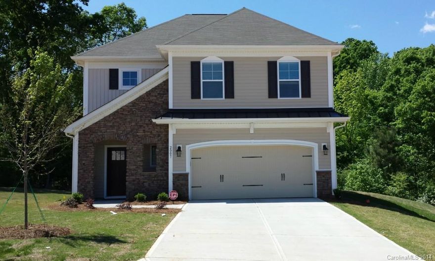 A Rare find! Open floor plan, 4 bedrooms, Great lot, and Loaded at an affordable price.  This home's  floor plan supports room to entertain on 1st floor w/hardwoods, fireplace in family rm, Granite in kitchen & baths, along with a gas range/stove. All bedrooms on 2nd floor. HDMI wired for your TV and a very efficient 14 SEER HVAC system - controlled by a wifi enabled thermostat that can be adjusted from anywhere. Pictures are of similar home. Ask how you can get a LARGE $15,000 in Savings.