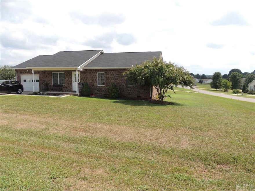 This 3 bed/2 bath brick home has a nice sized corner lot, in a great neighborhood, grocery store near by, and easy access to Hwy 16. Open floor plan makes it ideal for entertaining. The square footage was added onto with the Bonus rm. tax value says 1290sqft but hasn't been re evaluated.  Actual square footage is 1407. New roof in 2014. AC compressor was replaced in 2010. Septic pumped in 2013.  Don't miss out on this well maintained home! refrigerator is negotiable.  Make us an offer.