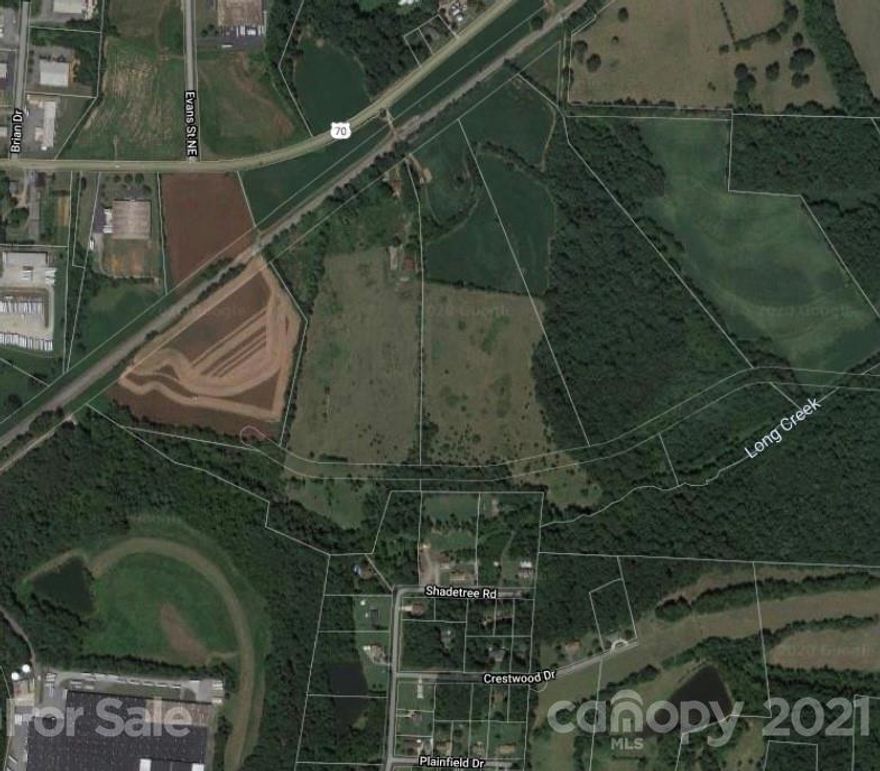 60.60 Acres of Commercial Parcel with 878' of paved frontage and 2 Railroad entrance on Conover Blvd. E, power already on property, city water and sewer availability.

Modified Listing from 63.75 to 60.60acs. 3rd parcel selling on separate MLS Listing.
