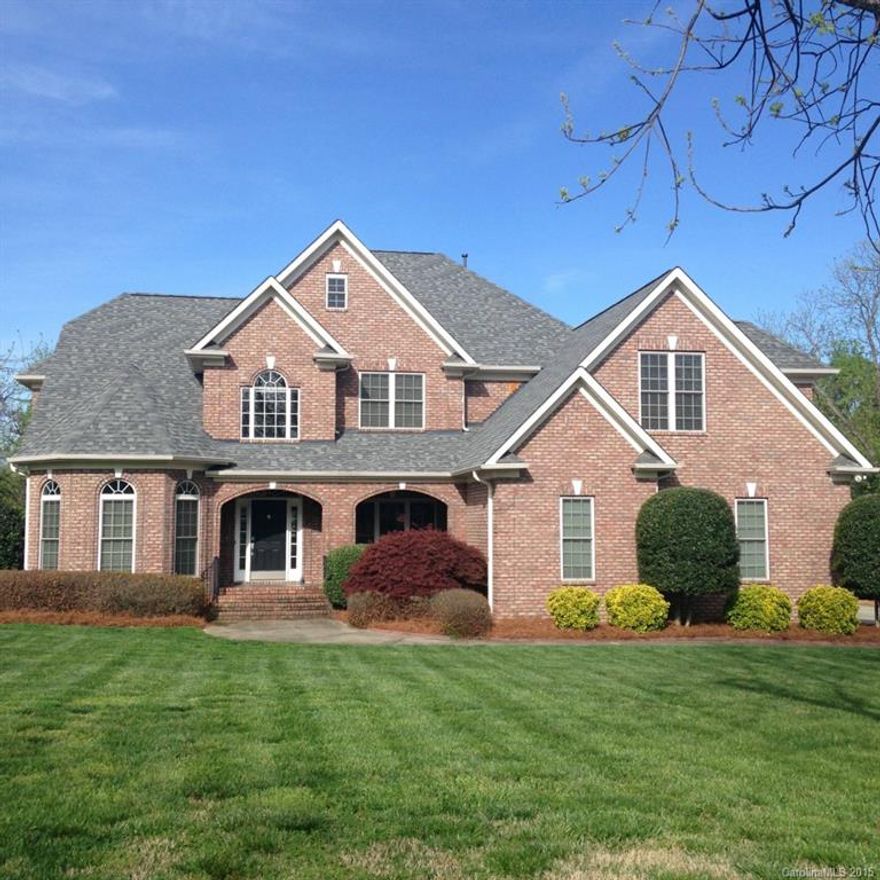 Beautiful full brick custom home situated among mature pecan trees. Formal dining, gourmet kitchen w/an island & granite, luxurious master suite on the main level, 3 large BDR upstairs, large bonus, & walk-up attic. Outside enjoy a screened porch, deck,workshop, area, a large level lot & private backyard. Custom cabinets in oversized garage.