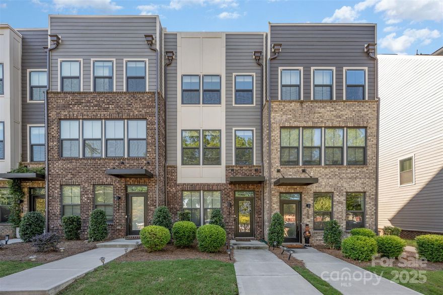 Modern 4-story townhome in a prime Charlotte location. This 3 bed, 3.5 bath property features en-suite bathrooms in every bedroom, ideal for privacy and convenience. The open-concept main level boasts sleek, modern finishes with abundant natural light, plus a private deck for outdoor living. The top floor includes a spacious rooftop terrace, perfect for entertaining or relaxing. A tandem garage offers room for two cars or additional storage. Walkable to shopping, dining, and parks, with easy access to Uptown, SouthPark, and major highways. Stylish, low-maintenance living at its best!