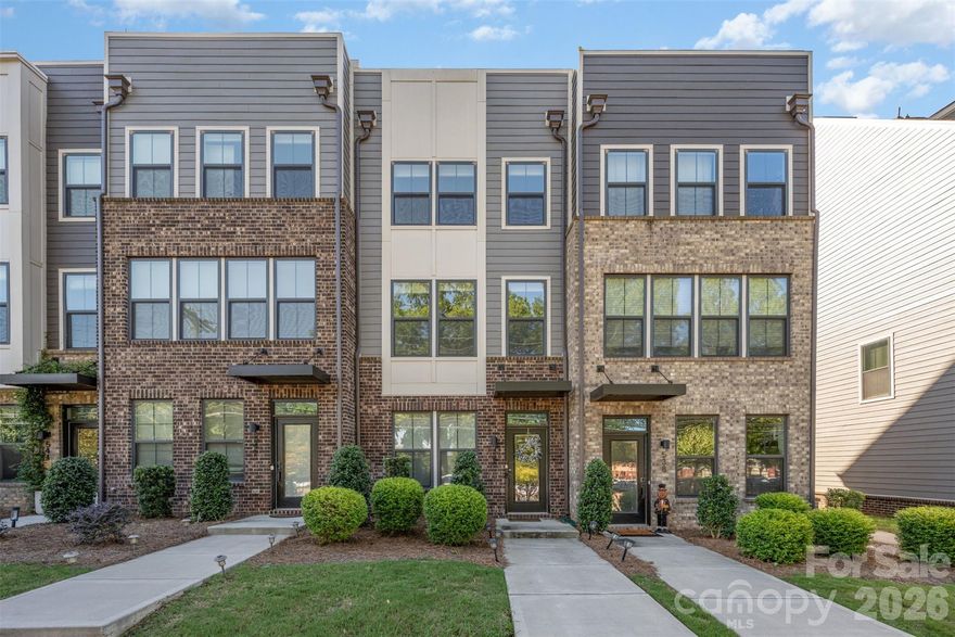 Modern 4-story townhome in a prime Charlotte location. This 3 bed, 3.5 bath property features en-suite bathrooms in every bedroom, ideal for privacy and convenience. The open-concept main level boasts sleek, modern finishes with abundant natural light, plus a private deck for outdoor living. The top floor includes a spacious rooftop terrace, perfect for entertaining or relaxing. A tandem garage offers room for two cars or additional storage. Walkable to shopping, dining, and parks, with easy access to Uptown, SouthPark, and major highways. Stylish, low-maintenance living at its best!