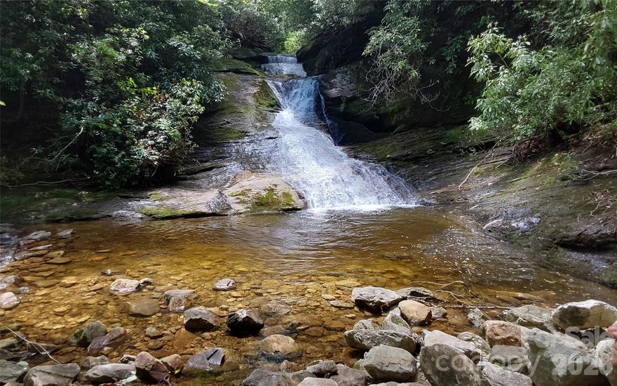 This beautiful parcel of land located within the Lake Toxaway Estates offers an incredible opportunity for those seeking a private mountain getaway. This 118 ac property offers substantial private space; an attractive option for building a residence or multiple residences. This property is NOT in a conservation easement like most others in the area are. This property comes with lake access, stunning views of Lake Toxaway, and cliff-faced mountains, frontage along the pristine Toxaway River w/falls and pools, and gentle topography. Just minutes to Lake Toxaway Country Club & The Greystone Inn and marina offers a range of amenities, club activities and social events. The property is close to North Carolina's largest private lake providing additional water-based activities and enjoyment of the natural surroundings. As part of Lake Toxaway Estates, the owner can enjoy membership in the Lake Toxaway Country Club upon approval but not required.