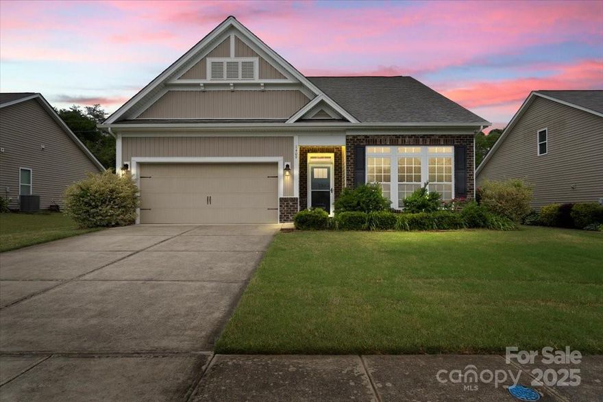 Welcome to easy living in this beautifully maintained 3-bedroom, 2-bath ranch in the sought-after Clover community of Timberlake! This one-level home offers a spacious, open floor plan with a relaxing sunroom / flexroom, a large kitchen with a 14' island, a breakfast nook, and a comfortable living area perfect for relaxing or entertaining. The primary suite features a walk-in closet and ensuite bath with dual vanities. Enjoy the outdoors on the back patio. Yard maintenance can be included in HOA for added convenience! Neighborhood amenities include a pool, playground, clubhouse, walking trails, and a dog park—ideal for those seeking both relaxation and community. Located just minutes from Lake Wylie and within the award-winning Clover School District. This low-maintenance gem is perfect for downsizers, first-time buyers, or anyone craving comfort without the upkeep.   New roof & an existing termite bond. Optional HOA add-on for lawn service!