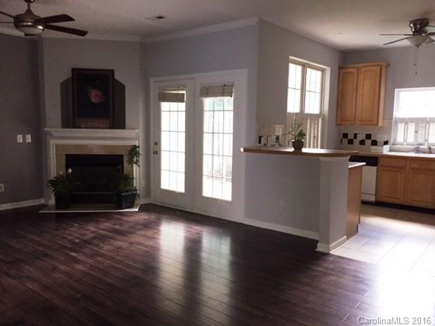 Completely renovated townhome in the heart of Ballantyne. Open floor plan with large screened porch. Gorgeous wood/tile floors on the main floor. Stunning great room with gas log fireplace. Everything has been freshly painted and looks like new. Hurry this one will not last long. 2nd floor features huge loft, 2 Beds/2 Baths.  New SS appliance in the kitchen option rent at $1400/month.