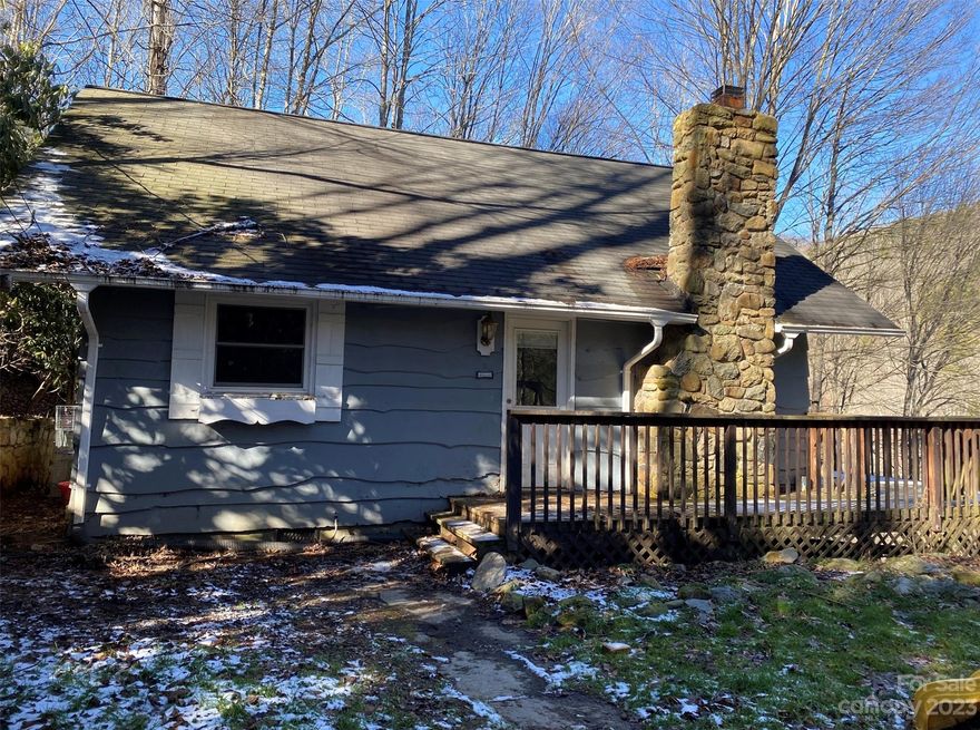 Adorable Cottage in Valle Crucis, just off of Broadstone.  This 2 Bedroom 2 Bath home has been lived in by the Seller's for the last 20 plus years and has had several updates during that time.  The First floor offers a Living Room with a wood stove insert and access to a large deck, Kitchen, Dining Room, 2 Bedrooms and a Full Bath.  Upstairs you will find another Full Bath and two bonus rooms that were both used as Bedrooms.  There are wood floors throughout and tile in both bathrooms.  This Cottage would make a great starter home or a cute little rental.