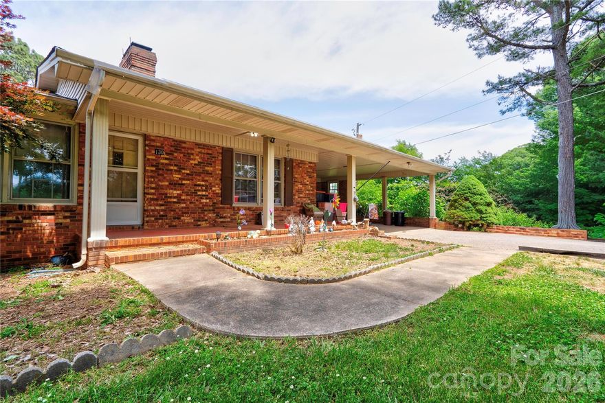 This brick ranch offers a great opportunity to make it your own! Situated on approximately 1.75 acres in the Belwood area of upper Cleveland County, this 3 bedroom, 2 bath home has plenty of potential for the right buyer. The home features a primary bedroom with private bath, a spacious second bathroom with double vanity, plus both a family room and separate living room offering flexible living space. An unfinished basement provides additional storage or future possibilities.  There are several rooms that can be used as bonus rooms or flex space.  Outside, you’ll find a covered front porch, large yard, and a detached garage/building with attached shed providing storage and space for equipment. With its solid layout and spacious lot, this property is ready for your personal touch and updates!