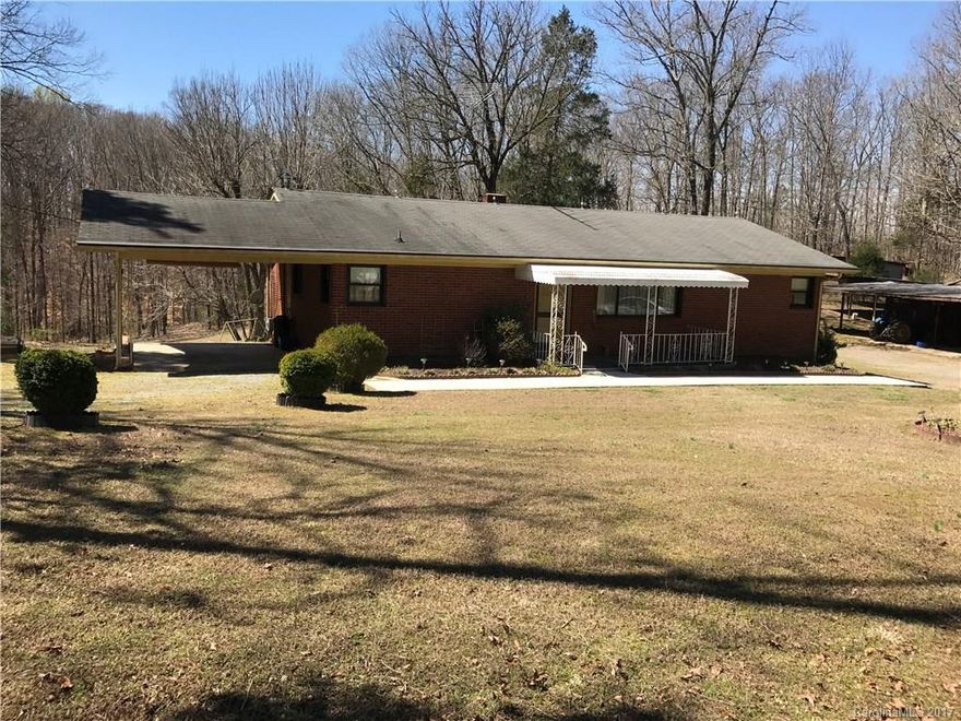 Private ranch home w/basement., 5.98 ac several buildings ,barn, mature landscaping,  lg bath, lg picture window in LR, eat-in Kit, basement laundry and laundry chute, wood burning stove capable of heating entire house,  oil furnace rarely used, central air approx. 3 yrs, well pump approx. 6 yrs, two wells, wood stove in garage shop, carport, 1/2 bath in basement.  Ready to move into or update as desired.  This property is being sold "AS IS". Furniture in home does not convey.