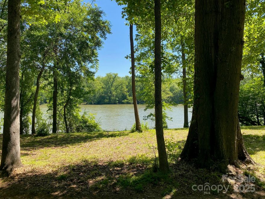 Beautiful Private 5.47 Acres on Lake Wylie, South Carolina - This Gorgeous Homesite with Private Beach Offers Some of the Most Pristine Water-Frontage in the Southeast.  More than 400' of Waterfront, Just Minutes from Downtown Charlotte, Charlotte Airport & Much More!