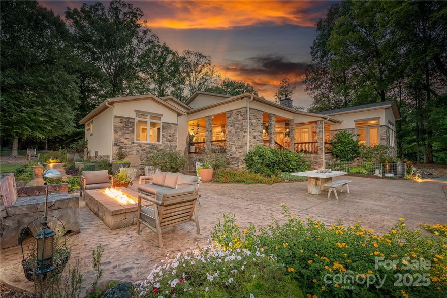 Bring your MOST discerning buyer! This custom home is unique & exquisite in every way. If superb quality, a unique and open floor plan, high-end finishes and an outdoor living/entertaining area second-to-none, then welcome home! Upon entering, your eye goes out to extensive covered porch w/ exotic tiger wood flooring & stone fireplace. The foyer is a WOW, w/ clarestory windows. The living area & kitchen are surrounded by a rounded wall of windows overlooking your own private estate. Rich & warm maple flooring throughout the main home. Elevated ceilings throughout! A gourmet kitchen w/ stacked cabinets, quartzite countertops, gas range, double oven & a walk-in beverage cooler. The owner's suite is a haven, overlooking more natural beauty & wildlife. On the other end of the home you will find a flex space plus two more bedrooms with a luxury bath between, each with their own vanities. Custom landscaping & hardscaping all overlooking a private, stocked pond. You will not be disappointed!