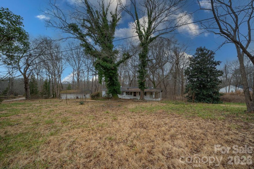 Build your vision on this 1 acre lot ideally located less than a mile from the NC/SC state line! Offering ample space and flexibility, this parcel provides the perfect balance of privacy and convenience, with easy access to nearby Marvin, Waxhaw and Indian Land. Benefit from the proximity to Highway 521 while still enjoying a peaceful setting.  An excellent opportunity for a custom home or investment in a desirable area. Per Lancaster county, stick built and modular homes are permitted. No mobile homes allowed. County water is available. Property was previously served by private septic and well.  
The home and other structures on the lot hold no value.