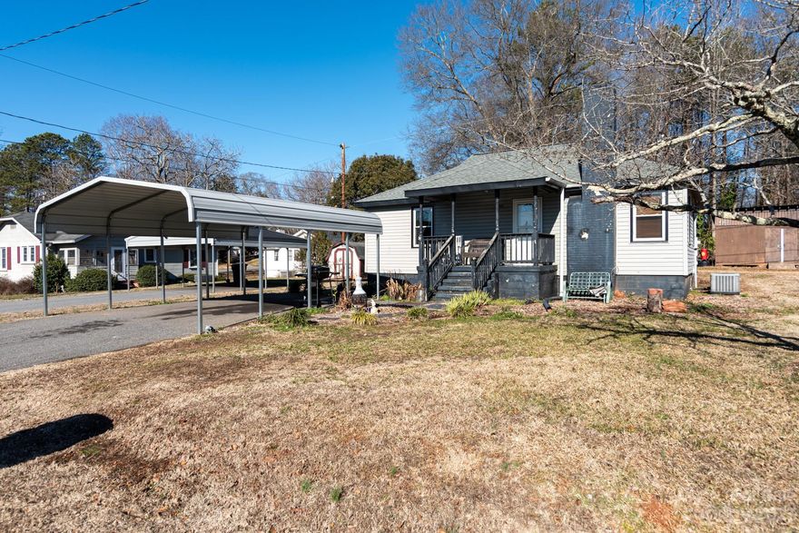 Move in ready! Perfect starter home or investment property. Check out this 2 bedroom, 1 full bath property on a dead end road in High Shoals. Roof was installed in 2020. Living room with gas logs fireplace, unsure if operational. Laundry room with shelving in kitchen. Newer laminate flooring in some rooms and recently painted interior. Level back yard with storage building. 2 car carport. City water and septic. Covered front and back porches. Close to Hwy 321 for easy access to Gastonia, Charlotte, Hickory and surrounding areas. This home is a budget-friendly option for those eager to get into the market. Affordability is the key here! If you're putting in GPS to drive by and take a look, the address will show as Dallas, not High Shoals.