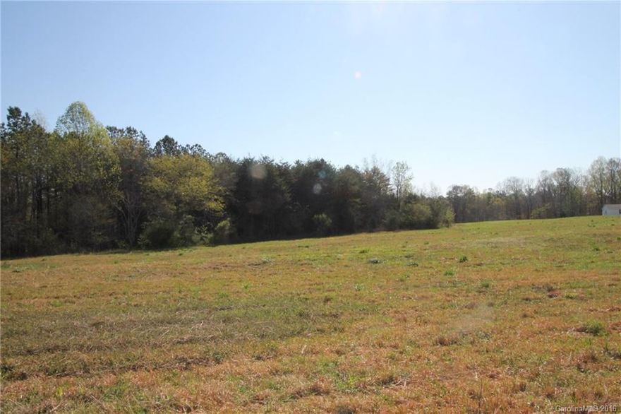 Now is your chance to own 8.5  acres for your getaway.  Only 30 minutes to Charlotte with low Lincoln county taxes. Perfect land for a house and small barn. Bring your own builder. No minimum square footage.