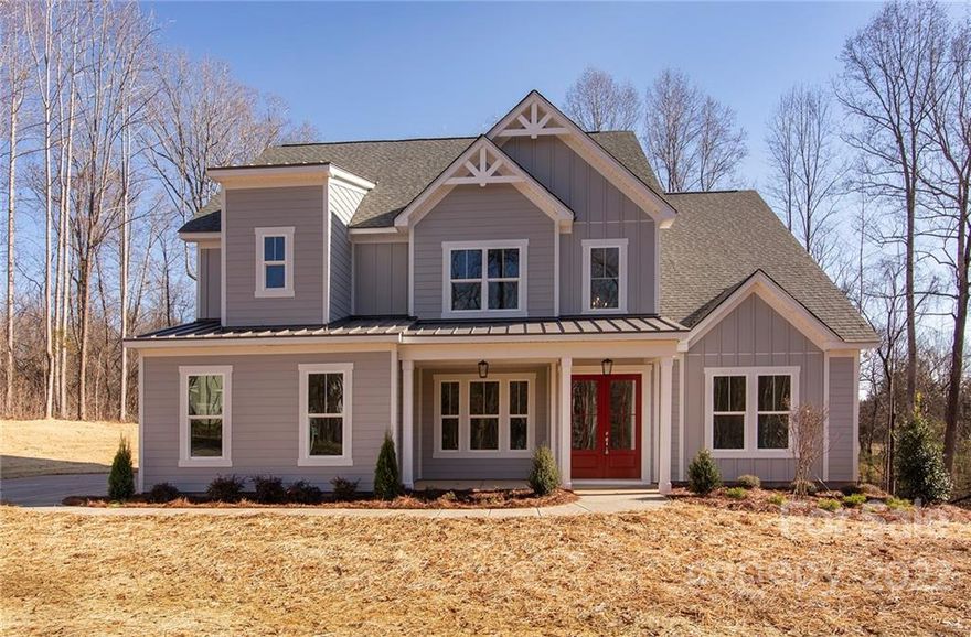 Escape to your own private paradise in Clover, SC with this stunning 2-acre modern farmhouse. As you enter, you'll be swept away by the open concept living, featuring a spacious kitchen with a massive t-shaped island and a two-story great room with a cozy fireplace. Step outside to the covered screened porch and soak up the serenity of your surroundings. The main level is complete with a luxurious owner's suite and a flex room perfect for a formal dining or private office, as well as a 3-car garage. Upstairs, three spacious bedrooms, each with their own bath and walk-in closet, await you. And, the cherry on top - a big bonus room with attached 1/2 bath! With finishes like quartz countertops, shaker style cabinetry, wide plank laminate floors, farmhouse sink and 36" professional range, this home is truly one-of-a-kind. But don't wait, construction has just wrapped up. Don't miss your chance to own a piece of paradise. Schedule your visit today!