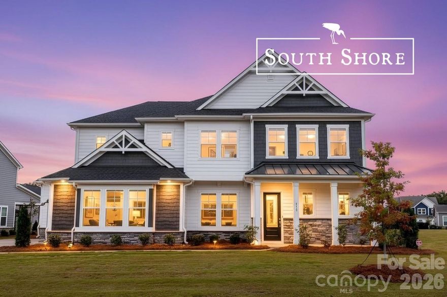 Lake Lifestyle Meets Luxury in McLean South Shore!

Set within the highly sought-after McLean – South Shore community, this beautifully designed five-bedroom, five-and-a-half bath home offers a rare combination of thoughtful architecture, refined finishes, and the relaxed lake-area lifestyle that has made this Belmont community so desirable.

Inside, the home immediately feels open and inviting. Ten-foot ceilings, rich wood flooring, and carefully selected designer touches create a sense of understated luxury throughout the main living areas. The great room centers around a gas log fireplace, providing a warm gathering space that flows seamlessly into the kitchen and dining areas.

The gourmet kitchen is both elegant and functional, featuring quartz countertops, stainless appliances, a gas cooktop, tile backsplash, white cabinetry, and a large island that naturally becomes the hub of conversation when friends and family gather.

With five spacious bedrooms and five-and-a-half baths, the home offers exceptional flexibility for guests, multigenerational living, or simply spreading out. The primary suite serves as a peaceful retreat, highlighted by a tray ceiling, an expansive custom walk-in closet, and a spa-inspired bath complete with dual vanities, a soaking tub, and a large glass shower.

A dedicated home office with sliding barn doors provides privacy for work or study, while additional flex space allows the home to adapt easily to changing needs.

One of the home’s most appealing features is its connection to the outdoors. An oversized sliding glass door opens to a spacious covered porch overlooking a private backyard, creating a natural extension of the living space and the perfect setting for quiet mornings or relaxed evenings.

Life in McLean South Shore means more than just a beautiful home. Residents enjoy a lifestyle centered around nature and recreation, with a playground, walking trails, and an amazing pool and clubhouse. Nearby, you’ll find Lake Wylie, Daniel Stowe Botanical Garden, Drift waterfront dining, and the marina at Morningstar—close enough to reach by golf cart—all just minutes from charming downtown Belmont and a convenient drive to Charlotte.

Furnishings are available for purchase, making this a rare turnkey move-in-ready offering.

Homes in this community rarely feel ordinary.
This one feels like exactly where you’re meant to be.

“Home is the starting place of love, hope, and dreams.”