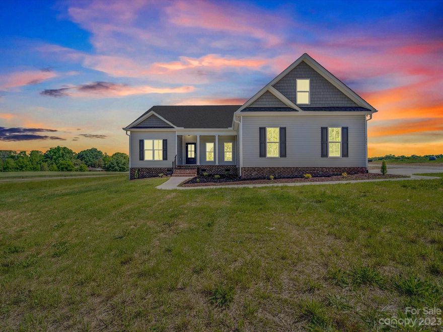 Beautiful 3 bedroom 2 bathroom split floorpan ranch only minutes from Monroe. This home features finished bonus room over garage, granite counters , tile backsplash, LVP flooring throughout, Stand up tile shower in primary bath. Custom cabinetry in kitchen, customized drop zone just inside garage, and upgraded fixtures throughout. Large back deck, two car garage, and over an acre to roam !