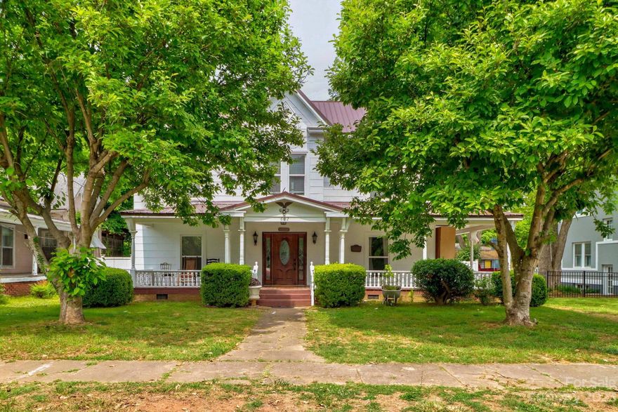Step back in time with this 1900 Victorian home but with all the upgrades!  Inviting wrap-around porch is sure to impress!  This 3 bedroom/2.5 bath offers over 2,400 sf with large, spacious rooms!  Primary bedroom on main level with spa-like bathroom; double vanities, beautiful tile shower and amazing walk-in closet.  Updated kitchen with granite countertops.  Upstairs has 2 bedrooms and modern bathroom with glass and tile shower.  Updated electrical and plumbing.  New HVAC 2018.  New metal roof 2017.  New flooring throughout.  Rear deck overlooks fenced yard with storage building.  Convenient location to Transportation Museum, shopping and restaurants.  Located in Spencer Historic District; district is on Register of Historic Places.  Make this charming home yours today!