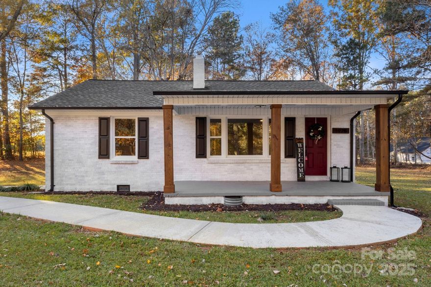 **11/24/25 - Multiple offers received** Welcome to 1978 Powell Ave - a beautifully transformed brick ranch on 1.28 flat, tree-lined acres in Lancaster. Built in 1957 but renovated like a 2025 home inside a classic brick shell, this 2BR/1BA property blends vintage charm with the comfort, confidence, and efficiency of a fully updated modern home. Nearly every interior surface and major system has been refreshed or replaced, offering something unusually rare at this price point: years of stress-free living. Inside, you’ll find a bright, inviting layout with all-new drywall, smooth ceilings, fresh paint, and LVP flooring throughout. The renovated kitchen includes painted cabinetry, new countertops, updated lighting, a modern sink and faucet, and brand-new stainless steel appliances. The bathroom feels crisp and current with a tiled walk-in shower, new vanity, ceramic tile floors, and stylish fixtures. Both bedrooms feature new windows, new doors, new lighting, ceiling fans, and updated finishes that make the home feel new from end to end. This home stands out for its deep system-level upgrades: new PEX plumbing, new electric water heater, new electrical panel with AFCI/GFCI protection, updated wiring with multiple new circuits, and a gas pack HVAC that’s been inspected, cleaned, and serviced. Efficiency upgrades include new attic insulation, new crawlspace insulation, and a brand-new vapor barrier encapsulation for a dry, protected foundation. Add in all new windows, new doors, and new interior/exterior lighting, and the result is truly turnkey comfort built to last. Outside, enjoy mature trees, fresh landscaping, a shed, and a two-car-width paved driveway with walkway. With the acreage space, there’s room for a future garage, carport, workshop, gardens, pets, play space, or simply enjoying the luxury of the land being all your own. All of this just minutes from downtown Lancaster, Home Depot, Aldi, restaurants, cafés, parks, and favorites like 521 BBQ and Stacks. Outdoor lovers enjoy Lancaster Golf Club, Andrew Jackson State Park, and nearby lakes and trails. With convenient access to both Charlotte and Columbia, the home works beautifully as a primary residence or investment. If you’ve been searching for a renovated home with land - and zero upcoming work to make it come together - this is it. Fresh, modern, efficient, and wrapped in timeless brick charm, this home offers the perfect blend of comfort, quality, and ease.