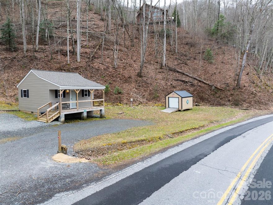 If you’re searching for a retreat near the legendary Tail of the Dragon or the pristine shores of Fontana Lake, this is the opportunity you’ve been waiting for. Located at 3807 Fontana Road, this property places you in the heart of the Fontana Dam area, with convenient access to both Robbinsville and Bryson City. Outdoor enthusiasts and motor lovers alike will appreciate the immediate proximity to some of the region’s most iconic routes, including the famed Dragon on US 129 and the breathtaking Cherohala Skyway. With this location on Highway 28, you can immediately test vehicle repairs, enjoy a few local curves, or complete a scenic loop from 28 to 129 to Yellow Creek—right from your doorstep. Unlike park models or temporary structures, this is a true stick-built home, offering greater durability, long-term value, and the solid construction today’s buyers appreciate. Built to withstand the elements while providing comfort and reliability, it’s designed for both weekend getaways and full-time enjoyment. The property also offers ample, easy parking — ideal for trailers, multiple vehicles, motorcycles, boats, or recreational equipment. Whether you're bringing friends for a riding weekend or hosting fellow anglers, there’s room to accommodate it all without hassle. For anglers and lake lovers, multiple access points to Fontana Lake and nearby trout streams make this an ideal fishing getaway. Whether it’s boating, casting a line, or simply soaking in the mountain views, adventure is always close at hand. With more than 100,000 visitors drawn annually to the nearby Fontana Dam, this property also presents exceptional short-term rental potential. Between its prime location for driving enthusiasts, fishermen, and outdoor adventurers, it offers the possibility of generating strong rental income that could offset ownership costs in just a few years. Whether you’re seeking a personal mountain escape, a motorsports basecamp, or an investment opportunity, this property delivers durability, convenience, lifestyle, and income potential in one remarkable package.
