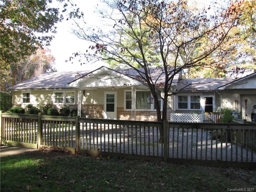 Sturdy ranch style home w/ many updates completed in 2012- Kitchen & appliances, baths, roof, most plumbing, wiring, windows & wood flooring. Kitchen/family room combination w/wood-burning stove & separate living room. Full basement for great workshop or storage, garage door on this level, one room framed and finished but not counted in sq ft.  Fenced front & back yards. Close to schools & shopping and easy access to interstate.  Perfect for starting out, slowing down, or down-sizing.