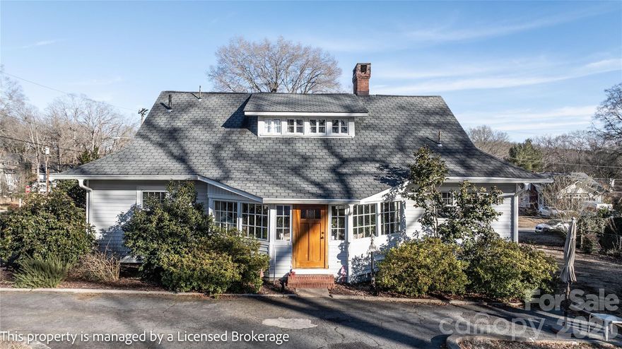 HEY LOOK ME OVER: You will fall in love with this beautiful Craftsman home. It is walking distance to 
downtown Badin where there is a small village of shops, that include restaurants, antique stores, coffee and bakery shop, a church, and is a short distance to the Badin school and the historic Badin Inn.  One of the great extra features of this home is the proximity to Badin Lake where you can launch your boat and spend your day on the water, go fishing or even enjoy a swim in the designated beach and swim area.   When you arrive on the circle drive and enter the back door, you will find a very inviting sunroom.  You will hesitate to venture any further because this room is so light filled and pleasant to relax in.  The kitchen is really cute, with access to a laundry porch.  From the kitchen, the butler panty with build in glass cabinets, leads to a separate dining room.  There are 2 bedrooms on the main level with a full bath.  The front of the home has a large cover front porch for sitting and visiting or just to relax and read a book.  A great place for your plants.   When you open the front door to the large living room with fireplace, you will see the lovely staircase wall.  When you ascend the stairs to the upper level, you will find one of the best features - a private bedroom and sitting area, plus full bath.  This room is so unique with its slopped ceilings and design.  Tucked away, your private retreat.   Wow, what a great room.  In the large back yard, there is a double detached garage with electric garage doors, attached to the garage is a shed with space for a lawn tractor and work area.   The double detached carport, used by the current owner as a sitting area can be used to enjoy the day and visit with your friends, maybe have a cookout and enjoy the warm or cool days. There are endless things you can do to make it your own.  This is a special home, don't miss it.