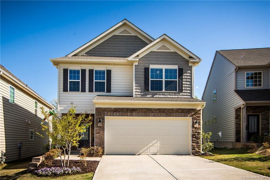 A must see! Like new home, move in ready w/stainless appliances, blinds, and all new paint. Home provides an abundance of natural light w/hardwoods on the main floor. Kitchen has upgraded subway tile backsplash, soft close cabinet doors and pull out drawers, gas range. Large great room w/gas log fireplace and ceiling fan. Great closet space! Open loft and large bedrooms. Home backs to trees and no homes to be built behind.