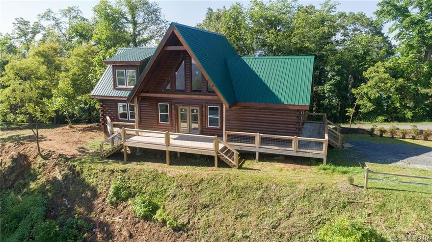 Log cabin located in a gated community, over 3700 foot elevation on a nice, gentle ridge lot, & long range views! Cabin was started in 2009 & not finished. Seller is finishing & adding features such as granite tops, pebble & tile showers, tile in baths, & stone fireplace.  One BR & 1 BA on each level & large loft on 2nd level. Both BR are positioned to wake up to the mountain views daily! Laundry on main level. Many upgrades including granite tops, metal backsplash, & cool light fixtures!