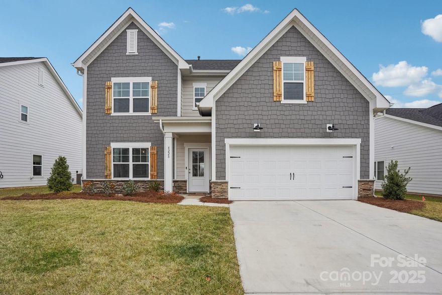 Discover this like-new construction home in the highly sought after Covington at Lake Norman neighborhood, w/in the desirable North Lincoln SD & offering both convenience & resort-style amenities, including pool, clubhouse, playgrounds, & dog parks—all with low HOA dues. This stunning 4 BR 2.5 BA home features an open-concept design. The kitchen boasts quartz countertops, white / soft close cabinetry, kitchen island, stainless steel appliances, walk in pantry w/ custom shelving, & a breakfast bar! The coziness of this home is amplified w/ the natural gas burning fireplace. Upstairs, you'll find spacious bedrooms & primary bedroom w/ a beautifully tiled en-suite bathroom & a large walk-in closet w/ newly installed shelving for enhanced storage. You'll love the peacefulness provided by the exterior that includes raised garden beds for the garden enthusiast. This updated home will also come w/ an EV Tesla charger, washer, dryer, refrigerator, blinds, & curtains/rods! Move in & enjoy!