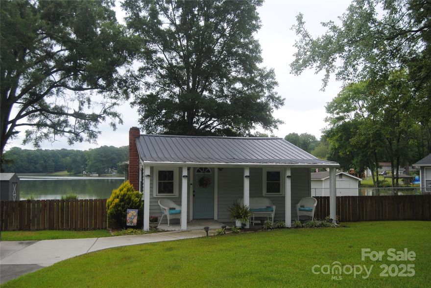 Waterfront cozy home on Cedar Pines Lake.  Gorgeous views, relaxing sunsets.  Enjoy fishing and paddling around the lake.  Home is a perfect place to get away from it all.  Great entertaining deck on back with lake in the background. 2 bedrooms, 1.5 baths.   A getaway, but yet close proximity to Lancaster with easy access to Highway 521 and Highway 5. There is no designated HOA Association, however there is a voluntary $35 yearly amount to help with any items needed.  The lake is controlled by the dam.