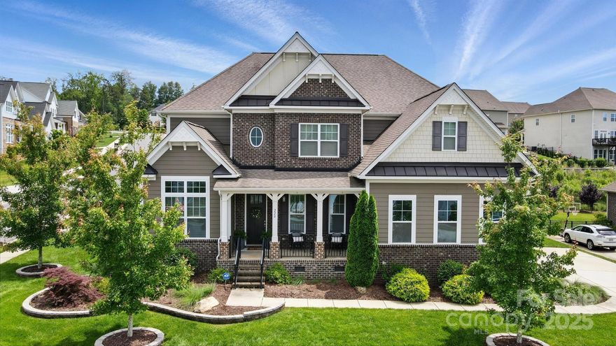 Stunning Executive Home in The Manors at Lake Ridge. This beautifully appointed 5-bedroom, 4.5-bath home offers luxury living in one of the area’s top communities. Featuring a spacious open floor plan, dedicated office, 1st floor guest suite, gourmet kitchen with high-end finishes and expansive living areas. Upstairs find the primary suite with spa-like bath, 2nd guest suite, 2 additional bedrooms with a jack-n-jill bathroom and a bonus room. Enjoy year-round relaxation on the screened porch overlooking the heated saltwater pool set within a private, landscaped backyard with mature trees. Perfect for entertaining or multigenerational living, with flexible spaces for guests, work-from-home, or recreation. A community in an award winning school district with resort like amenities, this is one you don't want to miss! Close proximity to Lake Wylie, Baxter Village, Kingsley, the Catawba River, the new Catawba Park and so much more! This is luxury, comfort, and convenience all in one.