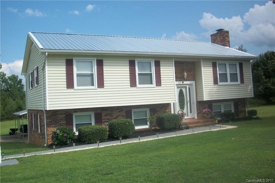 3.67 acres. Move in ready, new kitchen. All appliances, granite. Open concept to dining & seating. New furnace, new windows. Newer roof on home and large building. Family rm with fireplace dn, rec area. Large laundry rm. Don't miss this buy. Out building 1,824 sq. ft. Lovely area.