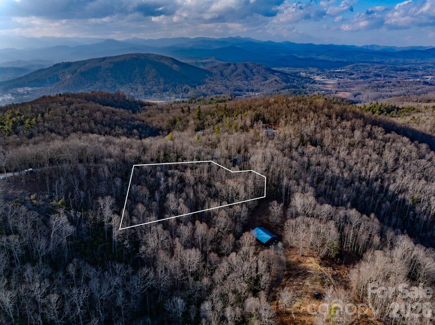 Now offering 2.0 acres of land located just minutes from Brevard and Hendersonville, NC. This beautiful parcel offers a private homesite with a level building area, while the remaining acreage features gently sloping terrain that provides both privacy and a natural setting.

The road leading to the homesite has already been cut in, and the main house pad has already been cleared, making it easier to begin the building process. Soils have been approved for a 3-bedroom septic system, and underground power as well as wired internet are available in the area.

This property is not part of an HOA and currently has no restrictions, with the exception that single-wide and double-wide manufactured homes are not permitted. The parcel is accessed via a privately maintained gravel road.

Please note that this address may not yet appear in GPS systems, as the property was recently subdivided from a larger parcel. Henderson County has approved the subdivision, and the seller has already obtained a zoning permit and a 911 address. A parcel identification number from the Henderson County Land Records Department is expected to be issued soon.

Properties like this—private acreage with improvements already in place and located this close to Brevard and Hendersonville—are becoming increasingly rare and do not come on the market often. Don’t miss this opportunity to build your mountain home in a peaceful setting while still being close to town. Call today to schedule your showing.