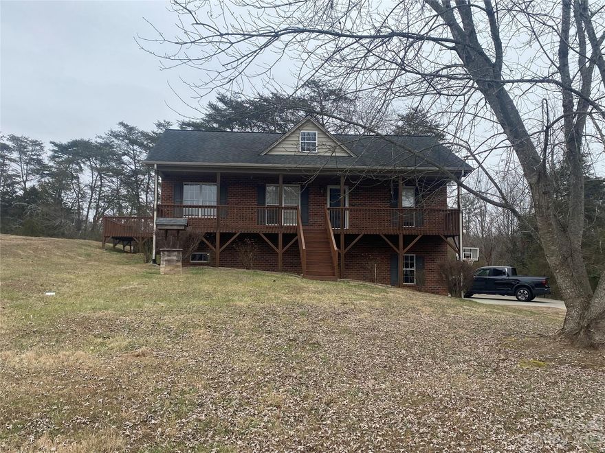 IMMACULATE is the word !!! Enjoy the country views off the front porch of this well maintained home. Walk in to the spacious great room with vaulted ceilings and wonderful views from the windows. The kitchen has stainless steel appliances and plenty of cabinet space. Desirable split bedroom plan.  The primary bedroom has a large bathroom and walk-in closet. The washer and dryer hookup is located in the large walk in closet making it convenient for doing laundry.  Beautiful hardwood floors in the living area and bedrooms.  The interior of the house has just been painted and the HVAC system is less than five years old.
Basement has a wonderful finished area great for a family room or man cave.  True two car parking in the garage area of the basement.
The back covered porch, large deck and above ground pool are perfect for gatherings and cookouts.  
Great outbuilding for storage or a great space for a workshop. 
Come see this house today before its gone!!!