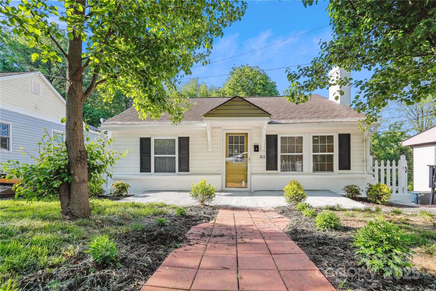 Cozy Cottage waiting for a new owner.  Just what you have been waiting for. Great home for your first purchase or down sizing getting to retirement or ready for your an investment home. This move in ready home is the one for you. Excellent location minutes to Uptown Charlotte, The Airport, restaurants shopping, schools and all the sporting events. Less the minutes from the interstate. Updated two bedroom one bath home.  Freshly painted with new cabinets in kitchen, new lighting throughout the home. Wood floors in main living areas of the home.  Wonderful Mud/utility room off the the kitchen with room to set up a small home office or a drop zone.  An extra bonus the crawlspace has a concrete flooring and lights. Could be used as a workshop or a great place for extra storage.  Home qualifies for  99%-100% financing available with Park National Bank for qualified buyer. Other Special financing programs available with Wells Fargo, Bank of America and many other lenders.